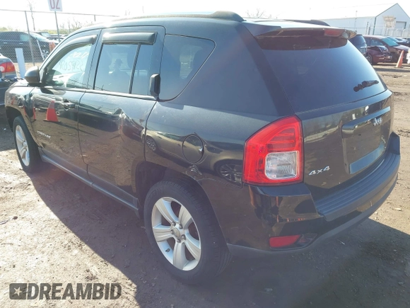 2013 Jeep Compass Sport with VIN 1C4NJDBB4DD113831, listed as a IAAI auction lot 42059122 with 135,062 mi miles. Bid and sale history available at carsss.com. Image 3.