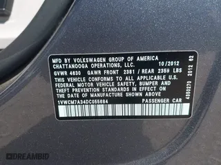 2013 Volkswagen Passat SEL Premium with VIN 1VWCM7A34DC055684, listed as a IAAI auction lot 42039636 with 167,746 mi miles. Bid and sale history available at carsss.com. Image 9.
