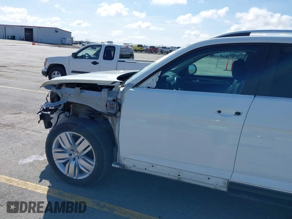 2019 Volkswagen Atlas SEL with VIN 1V2MR2CA2KC597854, listed as a IAAI auction lot 41924853 with 96,847 mi miles and . Bid and sale history available at DreamBid. Image 19.