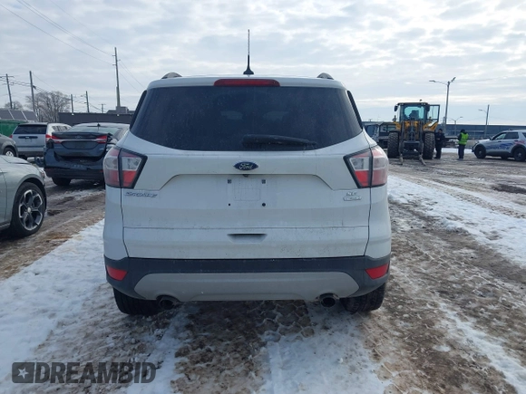 2018 Ford Escape SE with VIN 1FMCU0GD1JUC48757, listed as a IAAI auction lot 41631583 with 80,700 mi miles. Bid and sale history available at carsss.com. Image 16.