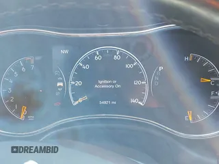 2021 Jeep Grand Cherokee 80th Anniversary z VIN 1C4RJFBG5MC737412, wystawiony jako IAAI lot #41753550 z przebiegiem 54 921 mil mil oraz . Historia ofert i sprzedaży dostępna na DreamBid. Obrazek 7.