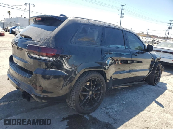 2018 Jeep Grand Cherokee Trackhawk z VIN 1C4RJFN90JC293820, wystawiony jako Copart lot #63778505 z przebiegiem 87 682 mil mil oraz Szkoda całkowita • Salvage title. Historia ofert i sprzedaży dostępna na DreamBid. Obrazek 3.