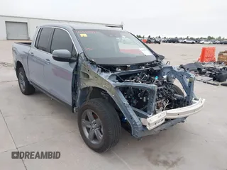 2023 Honda Ridgeline RTL with VIN 5FPYK3F58PB047099, listed as a IAAI auction lot 42313390 with Not provided miles and . Bid and sale history available at DreamBid. Image 1.