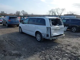 2016 Chrysler Town & Country Touring with VIN 2C4RC1BG8GR205497, listed as a IAAI auction lot 41774882 with 105,159 mi miles. Bid and sale history available at carsss.com. Image 3.