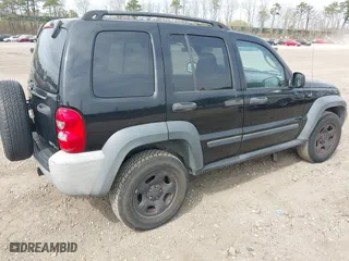 2006 Jeep Liberty Sport with VIN 1J8GL48K66W143231, listed as a IAAI auction lot 42040322 with 241,263 mi miles. Bid and sale history available at carsss.com. Image 4.