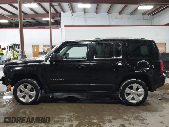 2014 Jeep Patriot Limited with VIN 1C4NJRCB8ED910340, listed as a IAAI auction lot 41396065 with 241,669 mi miles. Bid and sale history available at carsss.com. Image 14.