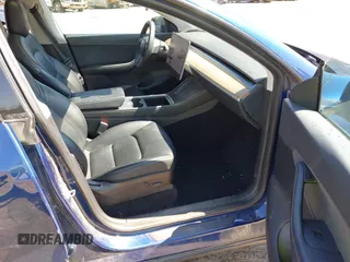 2021 Tesla Model Y Long Range with VIN 5YJYGAEE1MF207948, listed as a IAAI auction lot 41779570 with 100,859 mi miles. Bid and sale history available at carsss.com. Image 5.