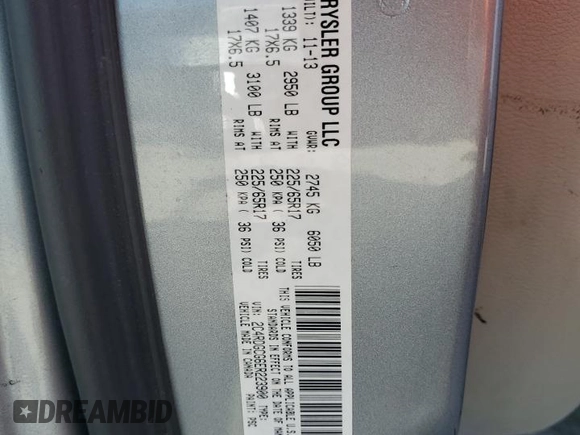 2014 Dodge Grand Caravan SXT z VIN 2C4RDGCG6ER223900, wystawiony jako Copart lot #56960965 z przebiegiem 101 275 mil mil oraz Szkoda całkowita • Salvage title. Historia ofert i sprzedaży dostępna na DreamBid. Obrazek 13.