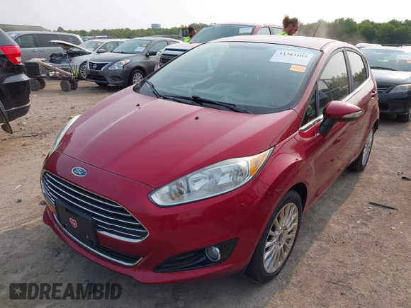2015 Ford Fiesta Titanium z VIN 3FADP4FJ1FM171680, wystawiony jako IAAI lot #42383105 z przebiegiem 51 396 mil mil oraz . Historia ofert i sprzedaży dostępna na DreamBid. Obrazek 17.