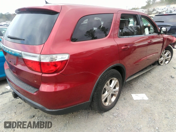 2013 Dodge Durango SXT with VIN 1C4RDHAG0DC694859, listed as a IAAI auction lot 40809655 with 190,130 mi miles and . Bid and sale history available at DreamBid. Image 4.