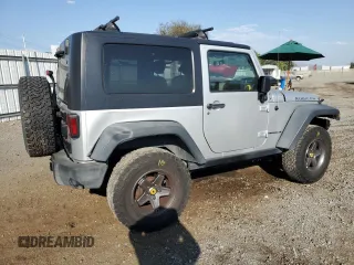2009 Jeep Wrangler Rubicon with VIN 1J4GA64149L757121, listed as a Copart auction lot 74258934 with 73,241 mi miles and Salvage Title. Bid and sale history available at DreamBid. Image 3.