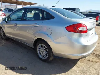 2011 Ford Fiesta SE with VIN 3FADP4BJ4BM177814, listed as a IAAI auction lot 41694964 with 180,565 mi miles. Bid and sale history available at carsss.com. Image 3.