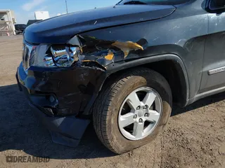 2012 Jeep Grand Cherokee Laredo with VIN 1C4RJFAG5CC118826, listed as a IAAI auction lot 42039801 with 158,153 mi miles. Bid and sale history available at carsss.com. Image 6.