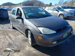 2002 Ford Focus ZX5 z VIN 3FAHP37342R169009, wystawiony jako IAAI lot #41684127 z przebiegiem Nie podano mil oraz . Historia ofert i sprzedaży dostępna na DreamBid. Obrazek 1.