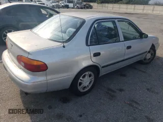 2001 Chevrolet Prizm z VIN 1Y1SK52811Z447352, wystawiony jako Copart lot #73916394 z przebiegiem 89 265 mil mil oraz Szkody całkowita. Historia ofert i sprzedaży dostępna na DreamBid. Obrazek 3.