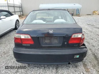 2000 Honda Civic LX z VIN 1HGEJ6670YL054677, wystawiony jako Copart lot #57126335 z przebiegiem 155 471 mil mil oraz Szkoda całkowita • Salvage title. Historia ofert i sprzedaży dostępna na DreamBid. Obrazek 6.