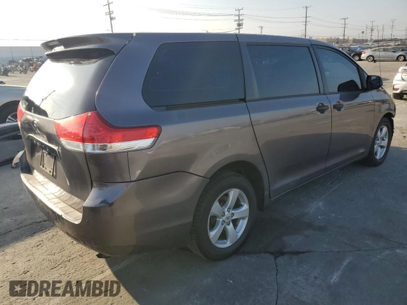 2012 Toyota Sienna with VIN 5TDKA3DC6CS010187, listed as a Copart auction lot 86885234 with 145,745 mi miles and Salvage Title. Bid and sale history available at DreamBid. Image 3.