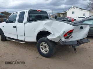 2003 Ford F-150 XL with VIN 1FTRX17W23NA71890, listed as a IAAI auction lot 41716266 with 1 mi miles. Bid and sale history available at carsss.com. Image 3.
