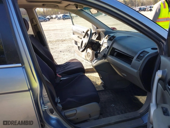 2007 Honda CR-V EX with VIN JHLRE48577C024338, listed as a IAAI auction lot 42068770 with 197,943 mi miles. Bid and sale history available at carsss.com. Image 5.