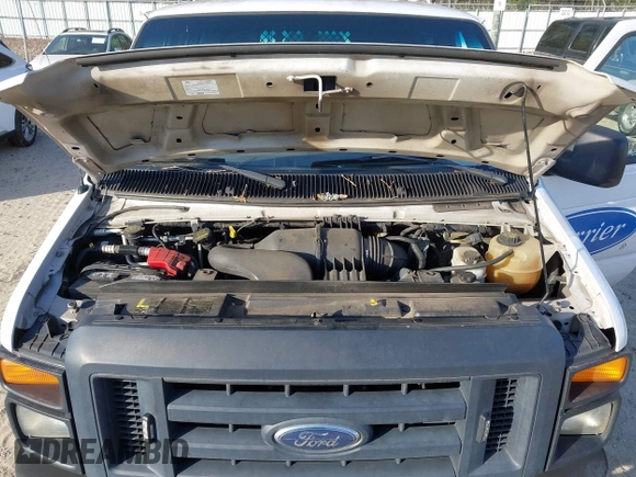 2013 Ford Econoline Cargo Commercial with VIN 1FTNE1EW4DDA35701, listed as a IAAI auction lot 41900327 with 226,733 mi miles and . Bid and sale history available at carsss.com. Image 10.