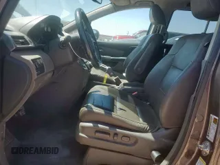 2015 Honda Odyssey Touring Elite z VIN 5FNRL5H97FB002739, wystawiony jako Copart lot #62060695 z przebiegiem 194 604 mil mil oraz Szkoda całkowita • Salvage title. Historia ofert i sprzedaży dostępna na DreamBid. Obrazek 7.