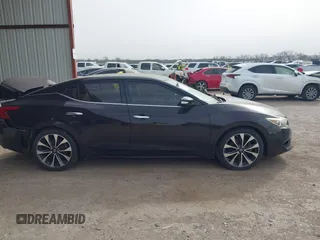 2016 Nissan Maxima SL z VIN 1N4AA6AP1GC379279, wystawiony jako IAAI lot #41738089 z przebiegiem 113 677 mil mil oraz . Historia ofert i sprzedaży dostępna na DreamBid. Obrazek 13.