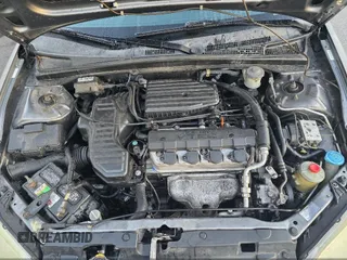 2005 Honda Civic EX with VIN 1HGEM22995L026024, listed as a IAAI auction lot 42020943 with 183,458 mi miles and . Bid and sale history available at DreamBid. Image 9.