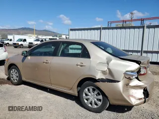 2011 Toyota Corolla L with VIN 2T1BU4EEXBC662749, listed as a Copart auction lot 84761994 with 66,697 mi miles and Salvage Title. Bid and sale history available at carsss.com. Image 2.