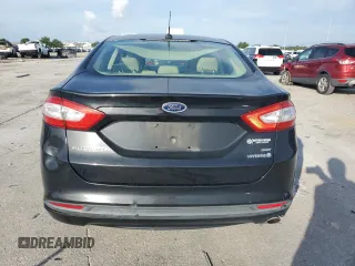 2013 Ford Fusion SE Hybrid с VIN 3FA6P0LU6DR157953, выставлен на аукционе Copart как лот 61175825 с пробегом 125 768 миль миль и Чистый • Clean title. История ставок и продаж доступна на DreamBid. Изображение 6.