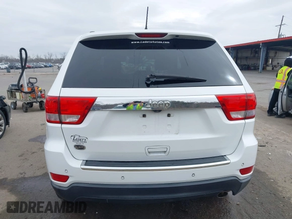 2013 Jeep Grand Cherokee Overland with VIN 1C4RJECG5DC648593, listed as a IAAI auction lot 41576630 with 187,098 mi miles. Bid and sale history available at carsss.com. Image 17.