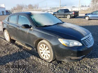 2012 Chrysler 200 LX with VIN 1C3CCBAB8CN113710, listed as a IAAI auction lot 41454218 with 259,057 mi miles. Bid and sale history available at carsss.com. Image 1.