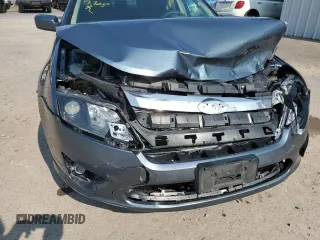 2012 Ford Fusion SE with VIN 3FAHP0HAXCR253493, listed as a Copart auction lot 63565455 with 126,582 mi miles and Salvage title. Bid and sale history available at DreamBid. Image 11.