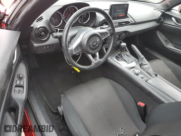 2021 Mazda MX-5 Miata Sport с VIN JM1NDAB78M0454772, выставлен на аукционе Copart как лот 63319665 с пробегом 58 373 миль миль и Списание • Salvage title. История ставок и продаж доступна на DreamBid. Изображение 8.
