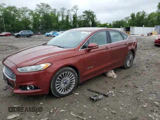 2014 Ford Fusion Titanium Hybrid with VIN 3FA6P0RU4ER387323, listed as a Copart auction lot 57107195 with Not provided miles and Salvage title. Bid and sale history available at DreamBid. Image 1.