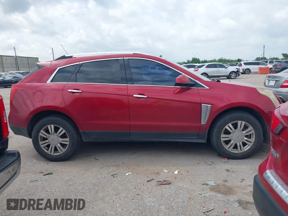 2015 Cadillac SRX Luxury Collection with VIN 3GYFNBE36FS560305, listed as a IAAI auction lot 42142934 with 160,543 mi miles and . Bid and sale history available at carsss.com. Image 13.