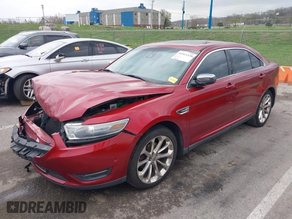 2013 Ford Taurus Limited with VIN 1FAHP2F84DG127859, listed as a IAAI auction lot 41913310 with 196,620 mi miles and . Bid and sale history available at DreamBid. Image 2.