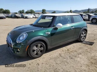 2015 MINI Hardtop with VIN WMWXM5C57FT941487, listed as a Copart auction lot 58052345 with 69,223 mi miles and Salvage title. Bid and sale history available at DreamBid. Image 1.