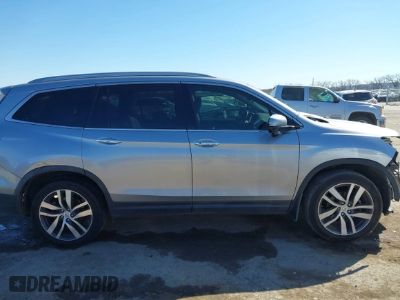 2017 Honda Pilot Touring with VIN 5FNYF5H93HB008088, listed as a IAAI auction lot 41699129 with 110,830 mi miles. Bid and sale history available at carsss.com. Image 13.