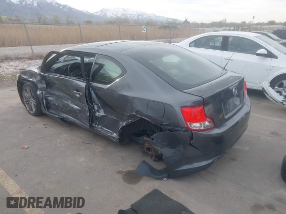 2013 Scion tC with VIN JTKJF5C76D3050374, listed as a IAAI auction lot 42024870 with 99,233 mi miles. Bid and sale history available at carsss.com. Image 3.
