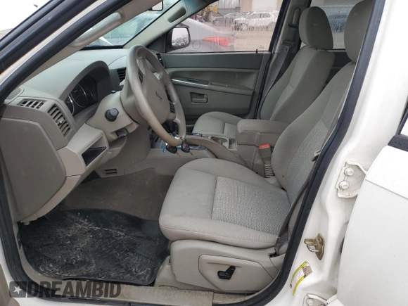 2007 Jeep Grand Cherokee Laredo z VIN 1J8HR48P17C616924, wystawiony jako Copart lot #43390805 z przebiegiem 180 141 mil mil oraz Szkoda całkowita • Salvage title. Historia ofert i sprzedaży dostępna na DreamBid. Obrazek 7.