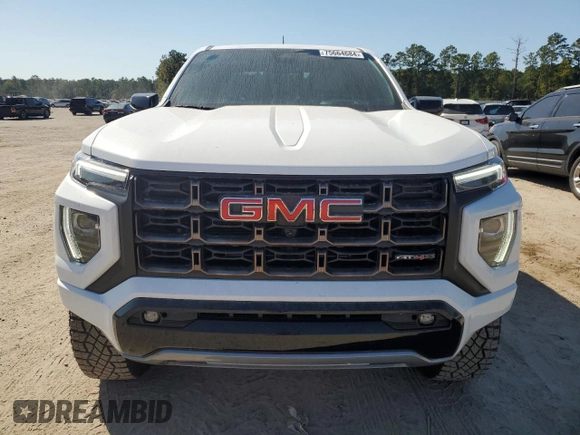 2023 GMC Canyon 4WD AT4X with VIN 1GTP6EEK6P1235222, listed as a Copart auction lot 75664684 with 9,736 mi miles and Salvage Title. Bid and sale history available at carsss.com. Image 5.