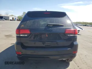 2017 Jeep Grand Cherokee Altitude z VIN 1C4RJFAGXHC828795, wystawiony jako Copart lot #53865265 z przebiegiem 65 152 mil mil oraz Szkoda całkowita • Salvage title. Historia ofert i sprzedaży dostępna na DreamBid. Obrazek 6.