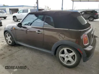 2010 MINI Convertible with VIN WMWMR3C50ATU97547, listed as a Copart auction lot 44780185 with 91,194 mi miles and Salvage Title. Bid and sale history available at DreamBid. Image 2.
