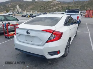 2018 Honda Civic EX with VIN 19XFC2F76JE206191, listed as a IAAI auction lot 41949231 with 146,118 mi miles and . Bid and sale history available at DreamBid. Image 4.