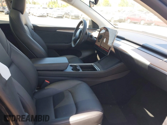 2023 Tesla Model Y Long Range with VIN 7SAYGDEE0PA111430, listed as a IAAI auction lot 42156924 with 35,950 mi miles and . Bid and sale history available at DreamBid. Image 5.