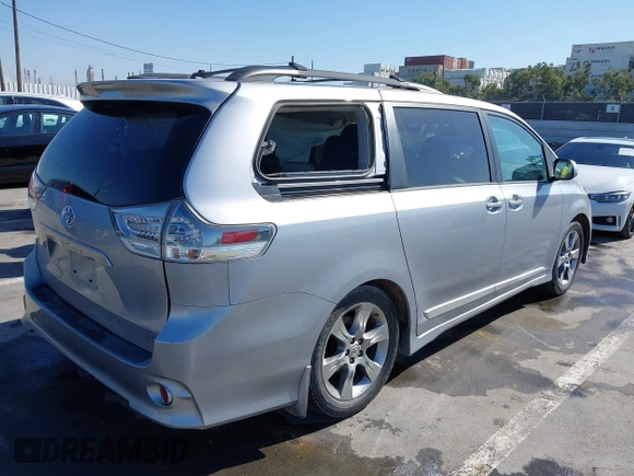 2012 Toyota Sienna SE with VIN 5TDXK3DC3CS189064, listed as a IAAI auction lot 42022390 with 193,016 mi miles and . Bid and sale history available at DreamBid. Image 4.