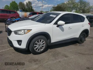 2015 Mazda CX-5 Touring with VIN JM3KE2CY7F0445603, listed as a Copart auction lot 54582225 with 123,319 mi miles and Clean Title. Bid and sale history available at carsss.com. Image 1.