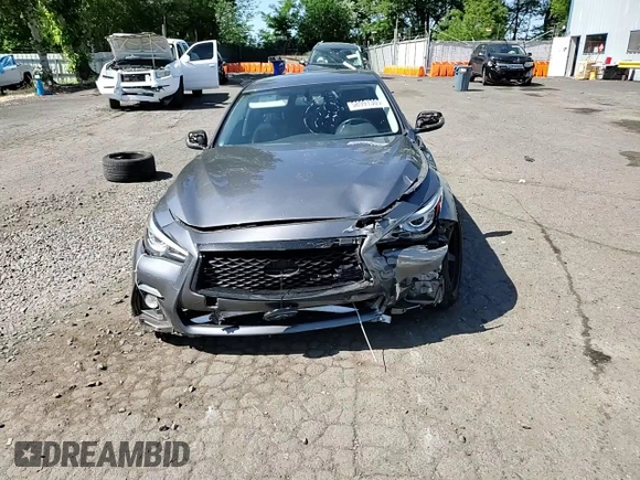 2014 Infiniti Q50 Premium z VIN JN1BV7AR1EM693471, wystawiony jako Copart lot #58991305 z przebiegiem 144 323 mil mil oraz Szkoda całkowita • Salvage title. Historia ofert i sprzedaży dostępna na DreamBid. Obrazek 13.