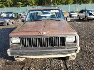 1996 Jeep Cherokee Sport with VIN 1J4FJ68SXTL269085, listed as a Copart auction lot 89119215 with 254,679 mi miles and Clean Title. Bid and sale history available at carsss.com. Image 5.