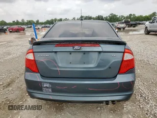 2012 Ford Fusion SE z VIN 3FAHP0HA7CR234996, wystawiony jako Copart lot #59365175 z przebiegiem 117 769 mil mil oraz Szkoda całkowita • Salvage title. Historia ofert i sprzedaży dostępna na DreamBid. Obrazek 6.